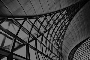 Abstract architectural ceiling design representing strategic vision and future revenue.