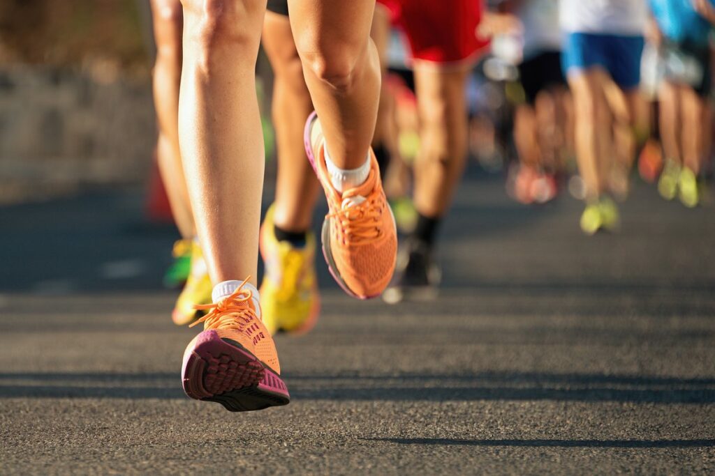 Runners mid-race on a city street