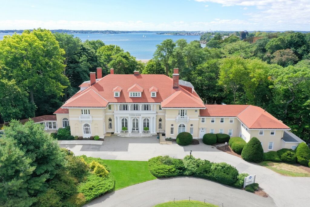 Aerial view of Tupper Manor and the Wylie Inn campus on the water in Beverly, Massachusetts